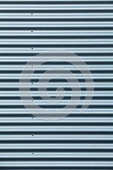 Tall shot of blue corrugated metal