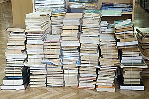 Tall stacks of old books