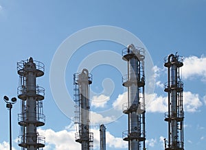 Tall steel fractionation or cooling towers at a large industrial chemical plant