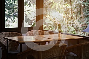 Tall table - Wooden table steel legs simplistic, tall bar stools in stylish kitchen with wooden cupboards.