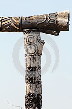 Tall Totem Pole on the top of a mountain photo
