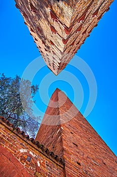 Tall towers are the remains of medieval architectural style of Pavia, Italy