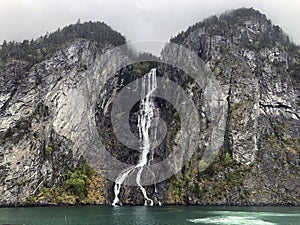 Tall waterfall Naeroyfjord, Norway. Breathtaking Norwegian nature