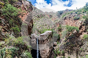 Tall waterfall in Quebrada del Colorado canyon near Cafayate, Argenti