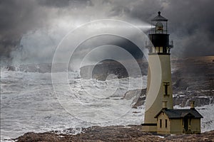 A tall whit lighthouse shinning light at night in a storm with a rough ocean and fog