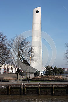 Tall white obelisk built on the port of rotterdam