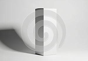 Tall white rectangular box with dramatic shadow on white background