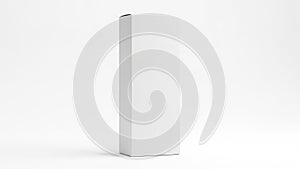 A tall white rectangular object standing against a plain white background
