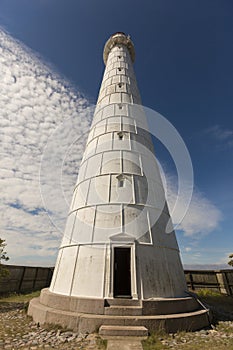 Tall and white Tahkuna lighthouse on Hiiumaa island