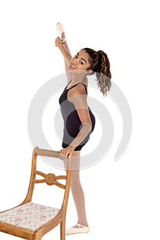 Tall young woman praxis ballet and stretching photo