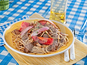 Tallarin Saltado, beef and noodle stir fry,a typical Peruvian dish photo