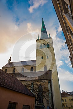 Tallinn, Estonia: Church of St. Olaf. Street of the old town and steeple of the Church