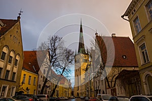 Tallinn, Estonia: Church of St. Olaf. Street of the old town and steeple of the Church