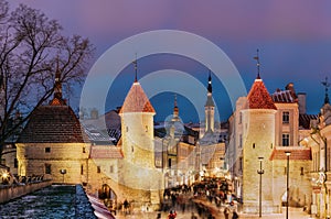 Tallinn, Estonia. Famous Landmark Viru Gate In Street Lighting At Evening