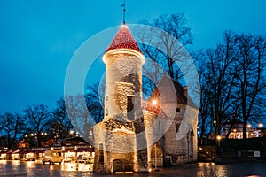 Tallinn, Estonia. Famous Landmark Viru Gate In Street Lighting At Evening Or Night Illumination.