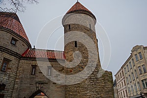 Tallinn, Estonia. Famous Landmark Viru Gate In Street Lighting. In Old Town. Popular Touristic Place