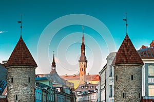 Tallinn, Estonia. Famous Landmarks Viru Gate And Town Hall On Background. Old Town. Popular Touristic Place. UESCO world