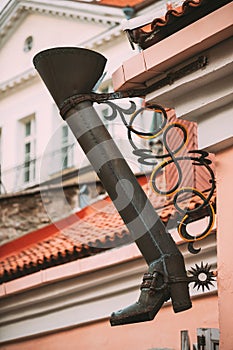 Tallinn, Estonia. Gutter In The Shape Of A Long Boot On The Long Leg Street Or Pikk Jalg