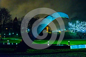 Tallinn, Estonia: Monument to the victims of the wrecked ferry Estonia. Church of St. Olaf. Night landscape