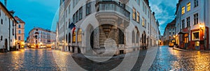 Tallinn, Estonia. Night Evening Panorama Panoramic View Of Old Vana turg And Suur-Karja Street In Tallinn