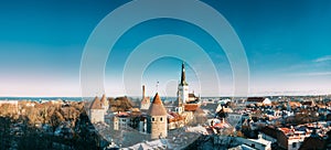 Tallinn, Estonia. Panorama Of Part Of Tallinn City Wall With Towers, At Top Of Photo There Is Tower Of Church Of St