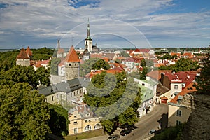 TALLINN, ESTONIA - View from Viewing Point Kohtuotsa, Toompea hill at The Old Town, St. Olaf`s Church, Baltic sea and cruise ferry