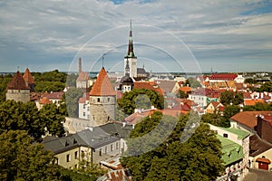 TALLINN, ESTONIA - View from Viewing Point Kohtuotsa, Toompea hill at The Old Town, St. Olaf`s Church, Baltic sea and cruise ferry