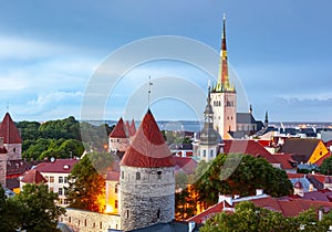 Tallinn skyline with St. Olav`s Church Oleviste kirik at sunset, Estonia