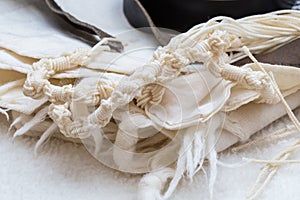 Tallit in close up - tzitzit photo