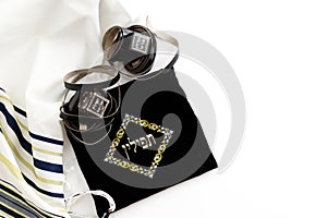 Tallit and tefillin on white background. ritual Jewish objects