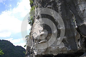 Tam Coc Bich Dong or Halong Bay on Land and Ngo Dong river stream running through magicient limestone mountains for vietnamese