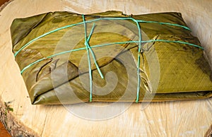 Tamal Typical Colombian Food Wrapped in Banana Leaves