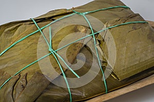 Tamal Typical Colombian Food Wrapped in Banana Leaves