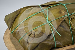 Tamal Typical Colombian Food Wrapped in Banana Leaves