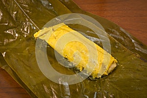 Tamal Typical Colombian Food Wrapped in Banana Leaves
