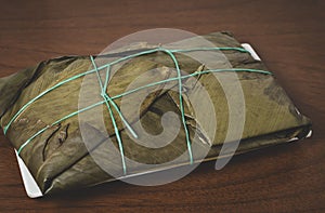 Tamal Typical Colombian Food Wrapped in Banana Leaves