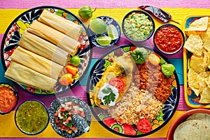 Tamale with corn leaf and filled chili pepper