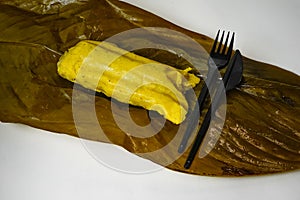 Colombian tamale recipe with steamed banana leaves photo