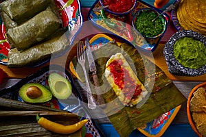 Tamale Mexican recipe with banana leaves photo