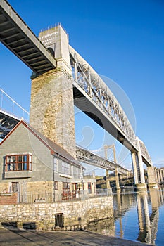 The Tamar Bridge road with the Royal Albert Bridge railway crossing the Tamar river between Cornwall and Devon ,Plymouth,