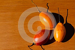 Tamarillho fruit with white background.