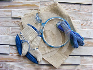 Tambour with threads for embroidery with pacifiers and baby shoes