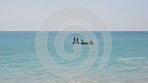 Tamilnadu fishermen getting their wooden boat or catamaran for fishing in Bay of Bengal