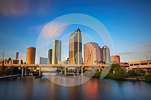 Tampa skyline at sunset with Hillsborough river in the foreground