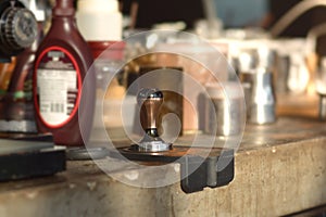 Tamper and piston/portafilter machine making espresso coffee