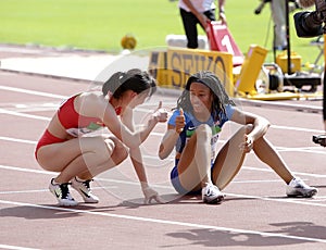 Jurnee Woodward and Tianlu Lan after 400 metres hurdles in the IAAF World U20 Championship in Tampere, Finland 11 July, 2018.
