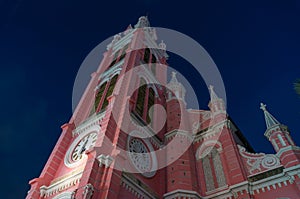 Tan Dinh church exterior against deep blue sky on the background