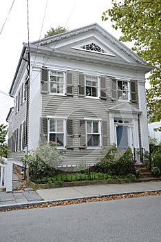 Tan federal style house in Stonington Connecticut