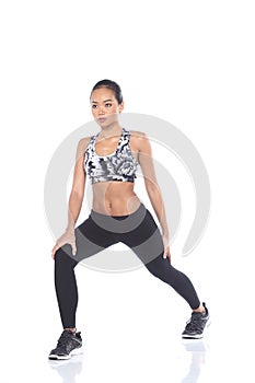 Tan Skin Asian Fitness Girl in Sport Bra black spandex pants Exercise warm up