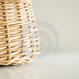 Tan Wicker Basket on a White Surface